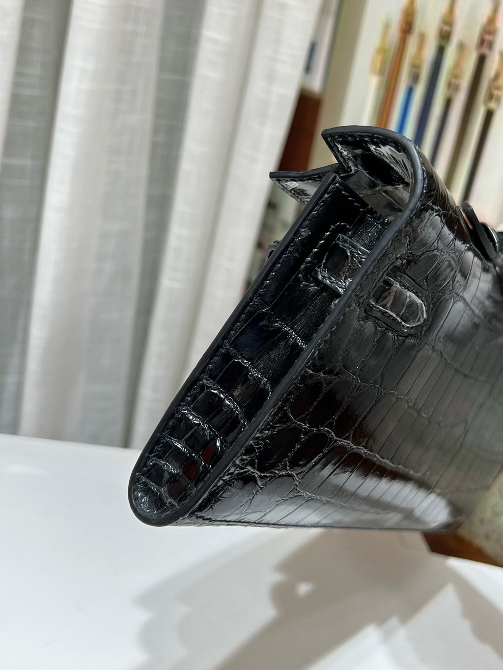 Hermès Kelly 31cm Black Cut Pochette Shiny Niloticus Croc Diamond Hardware