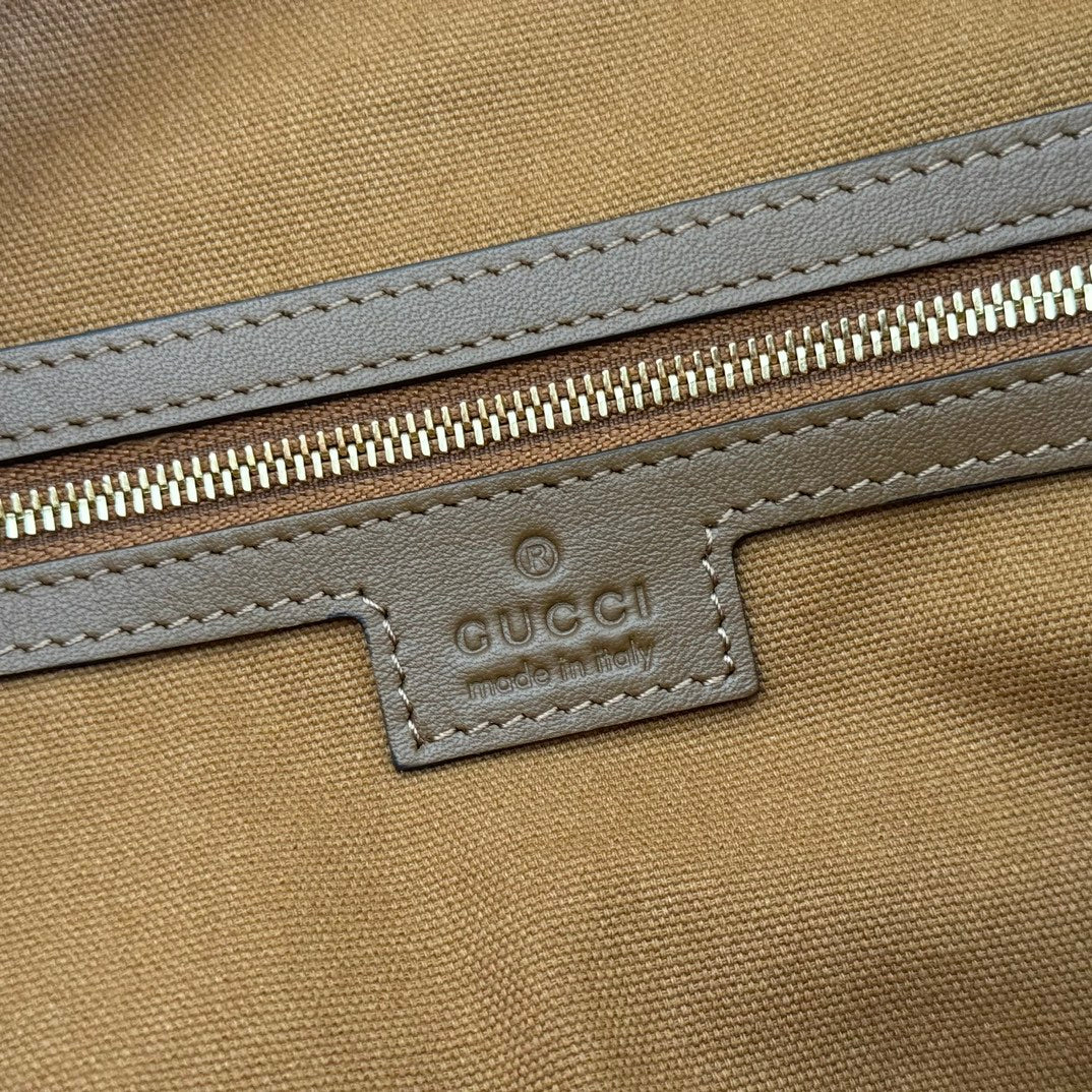 Gucci GG Embossed Leather Hobo Bag - Gold