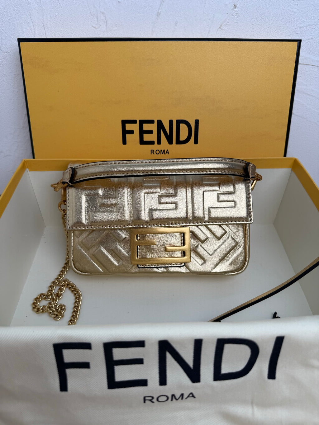 Fendi Baguette Embossed FF Leather Bag - Champagne Gold