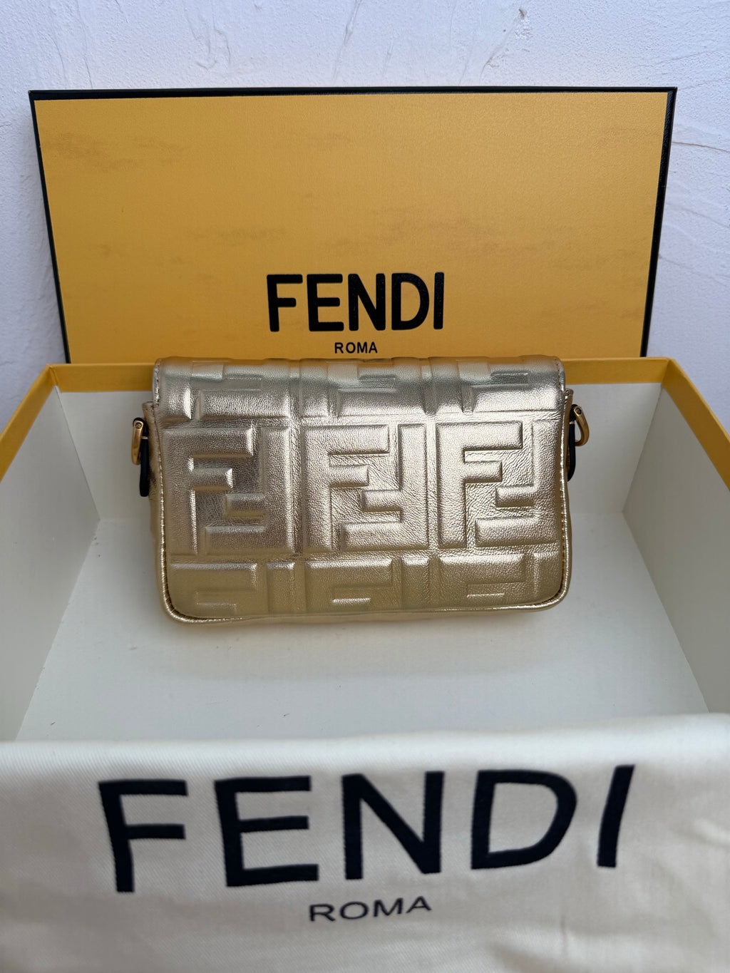 Fendi Baguette Embossed FF Leather Bag - Champagne Gold
