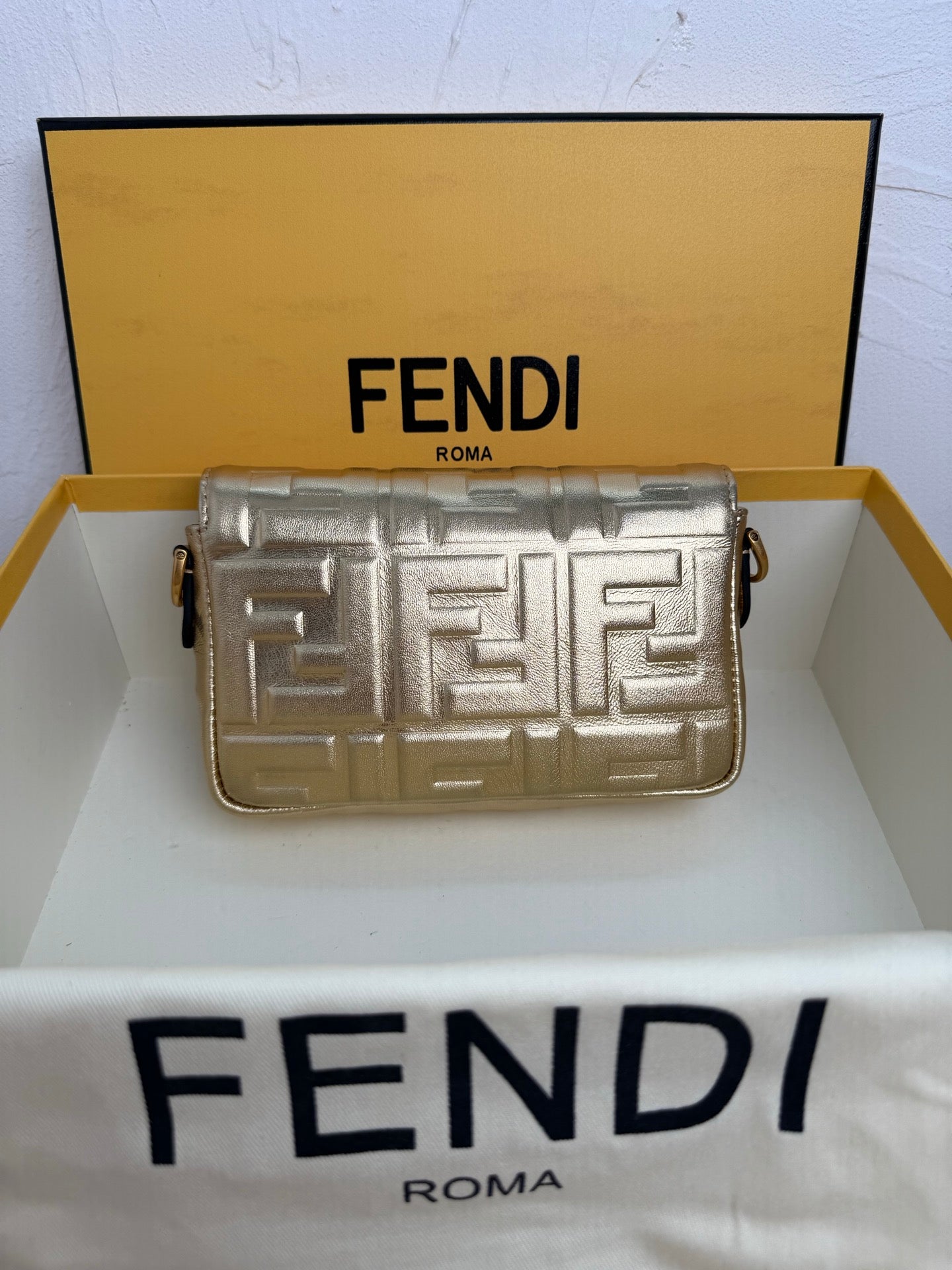 Fendi Baguette Embossed FF Leather Bag - Champagne Gold