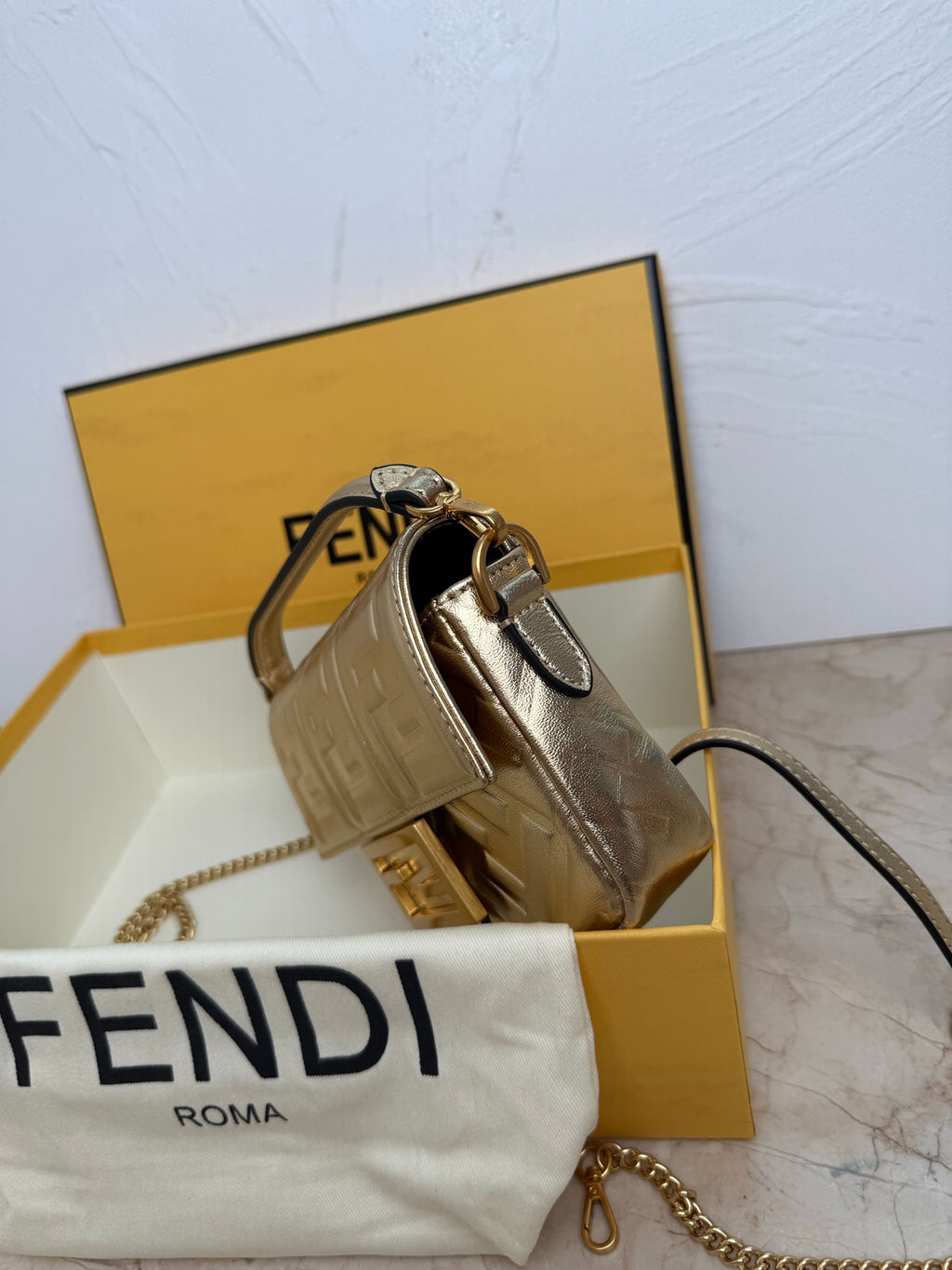 Fendi Baguette Embossed FF Leather Bag - Champagne Gold